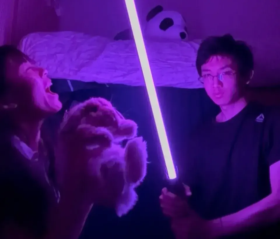 Holding lightsaber